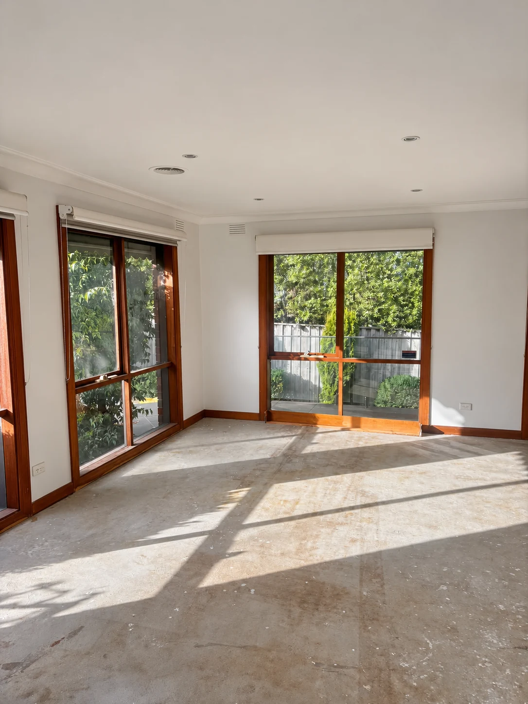 Light interior walls and ceiling with timber-framed windows